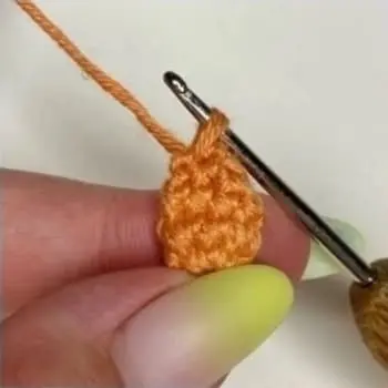 Crochet pumpkin witch arm