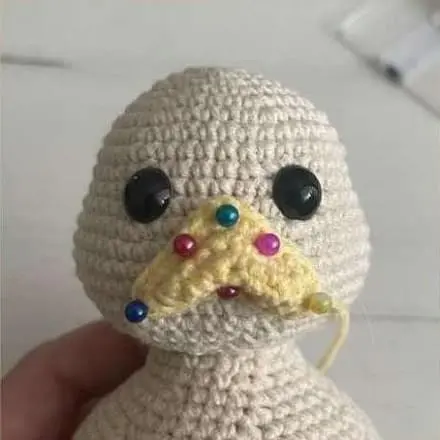 Crochet duck: sewing beak Crochet duck sewing beak